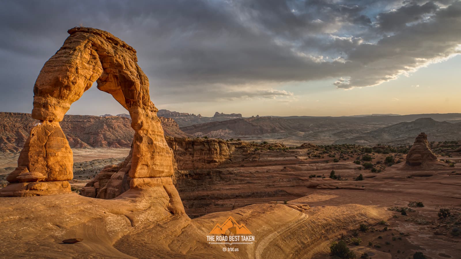 Arches National Park - Delicate Arch - A serene path through an ancient forest